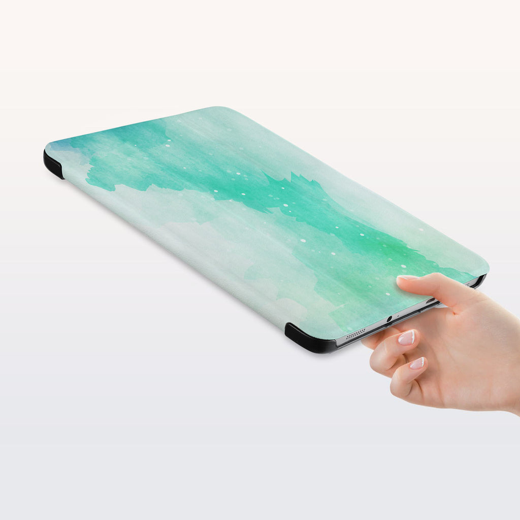 a hand is holding the Personalized Samsung Galaxy Tab Case with Abstract Watercolor Splash design
