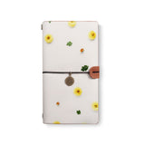 the front top view of midori style traveler's notebook with 6 design