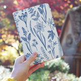 a girl holding personalized RFID blocking passport travel wallet with Flower design